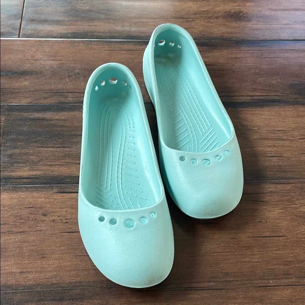 Mint Green Slip-On Flats by Crocs
